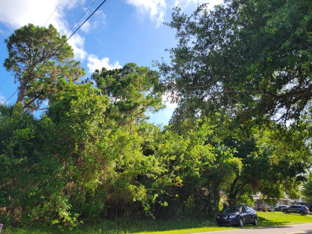 Photo of 7301 Winter Garden Parkway, Fort Pierce, FL 34951 (MLS # B26033528)