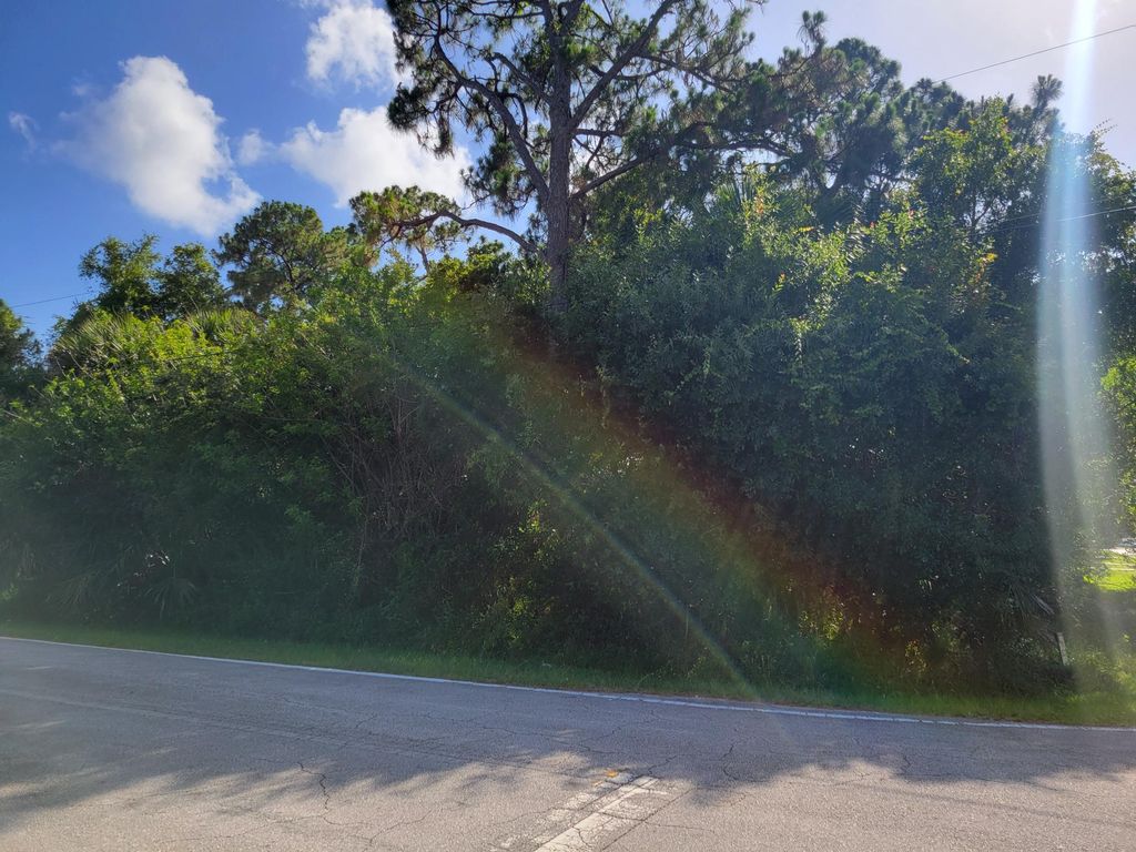 Photo of 7301 Winter Garden Parkway, Fort Pierce, FL 34951 (MLS # B26033528)