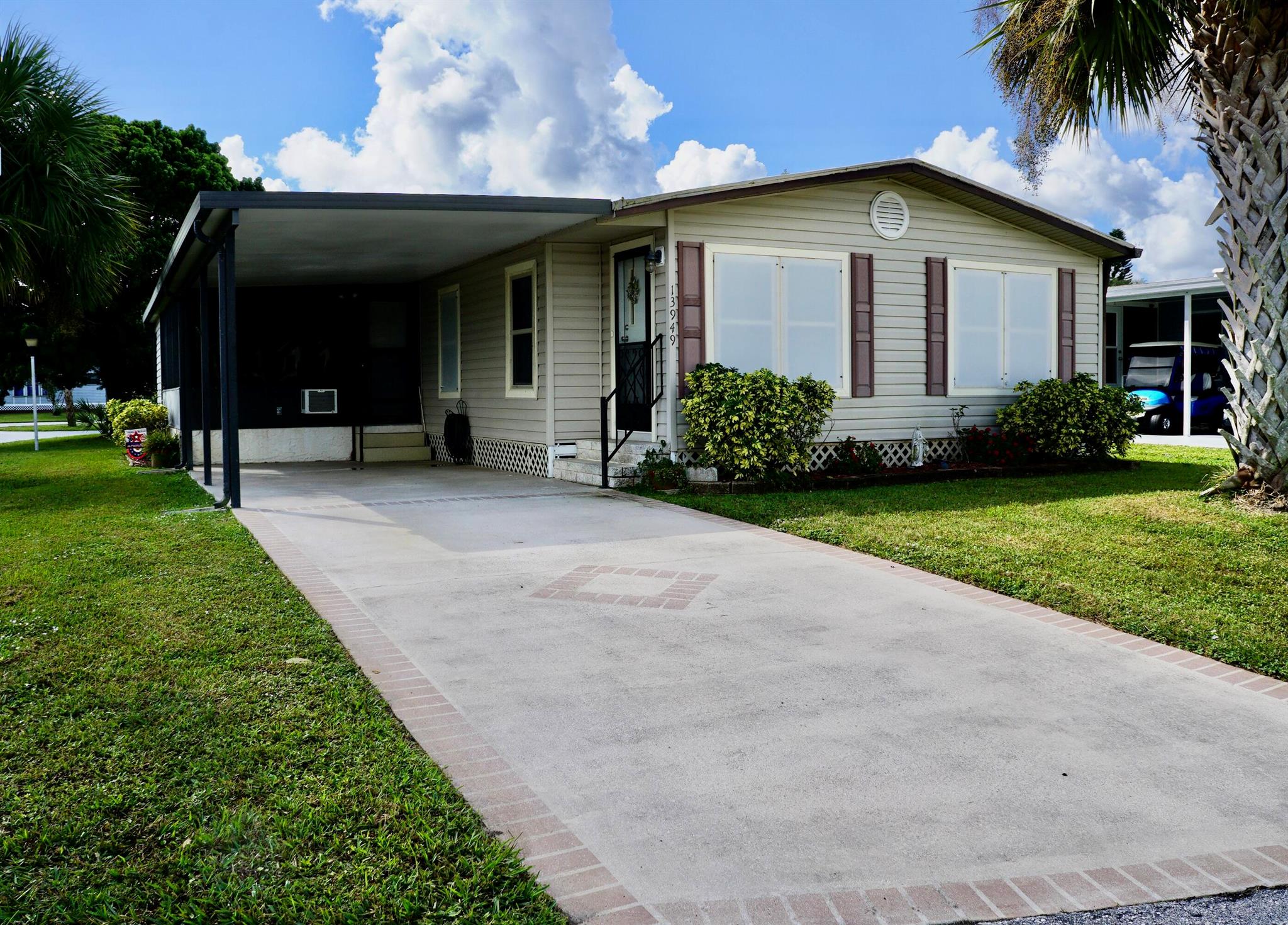 Clean, Furnished, and ready for a new owner. Just bring your toothbrush! This home has everything you'll need. Completely turnkey. This two bedroom/two bath home has plenty of entertaining space with a wide open concept. Need more room? Enjoy an additional 180sf in the all season Florida Room.This land leased home is located in the desirable Spanish Lakes Community. You must be approved by the park to purchase a home. This is a 55+ park that offers a relaxed lifestyle for those who are ready for a break. And for the active seniors, Spanish Lakes offers all inclusive, resort like, amenities with a community clubhouse, FREE golf, social events, tennis, billiards, shuffleboard, swimming, fitness center, and more. There is NO HOA fee. Your $899.27 land lease pays for everything.