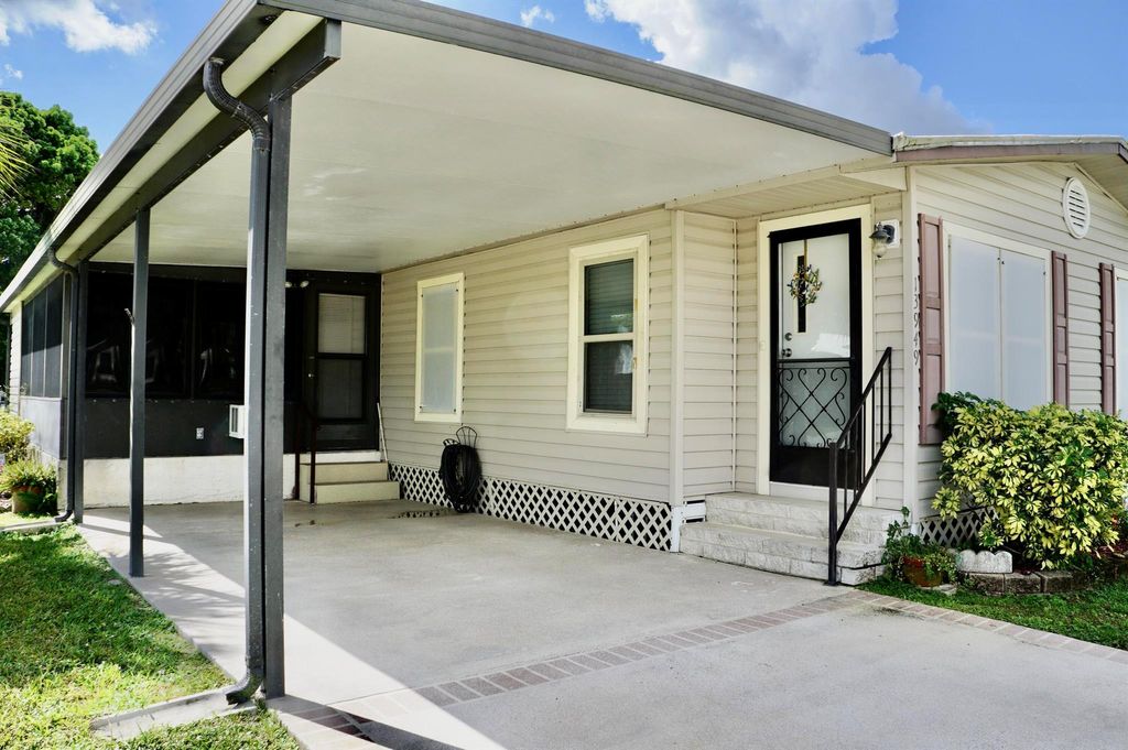 Photo of 13949 Adelfa Avenue, Fort Pierce, FL 34951 (MLS # R11135192)