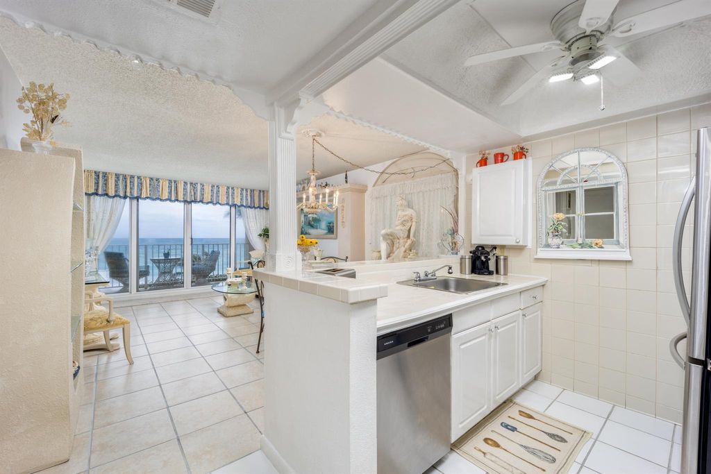 Photo of 9800 S Ocean Drive #306, Jensen Beach, FL 34957 (MLS # R10952230)