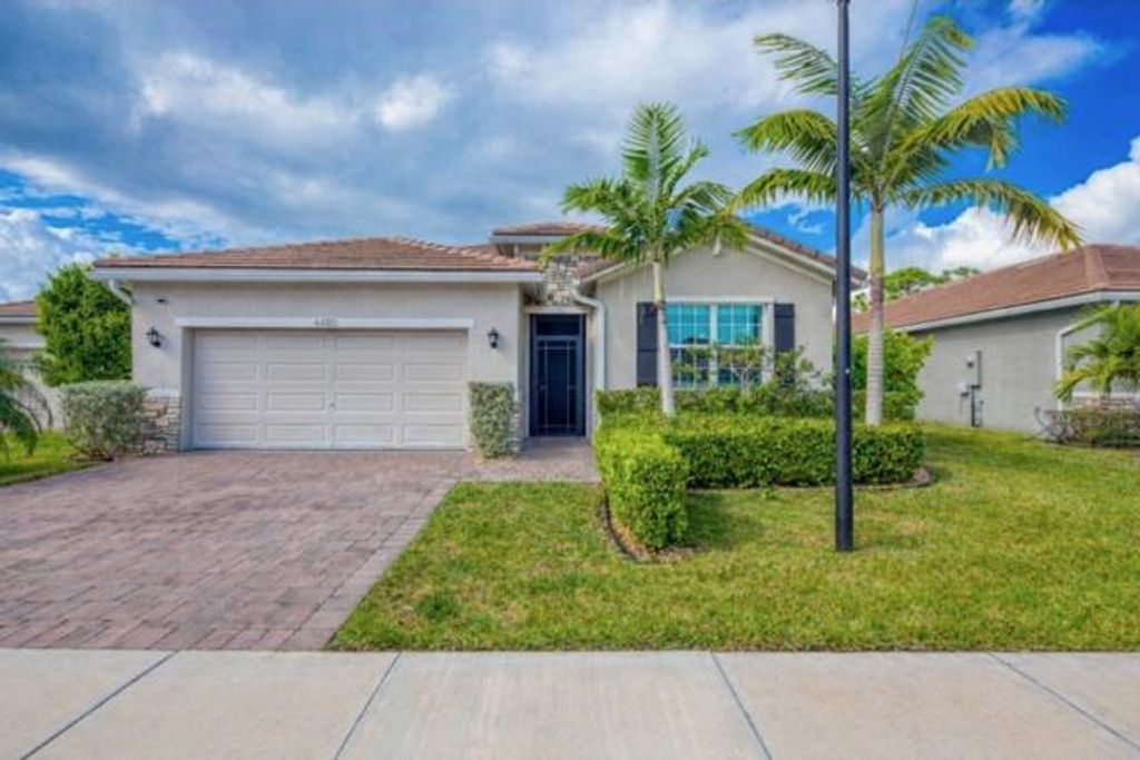 Photo of 4480 NW Oakleaf Court, Jensen Beach, FL 34957 (MLS # R11154516)