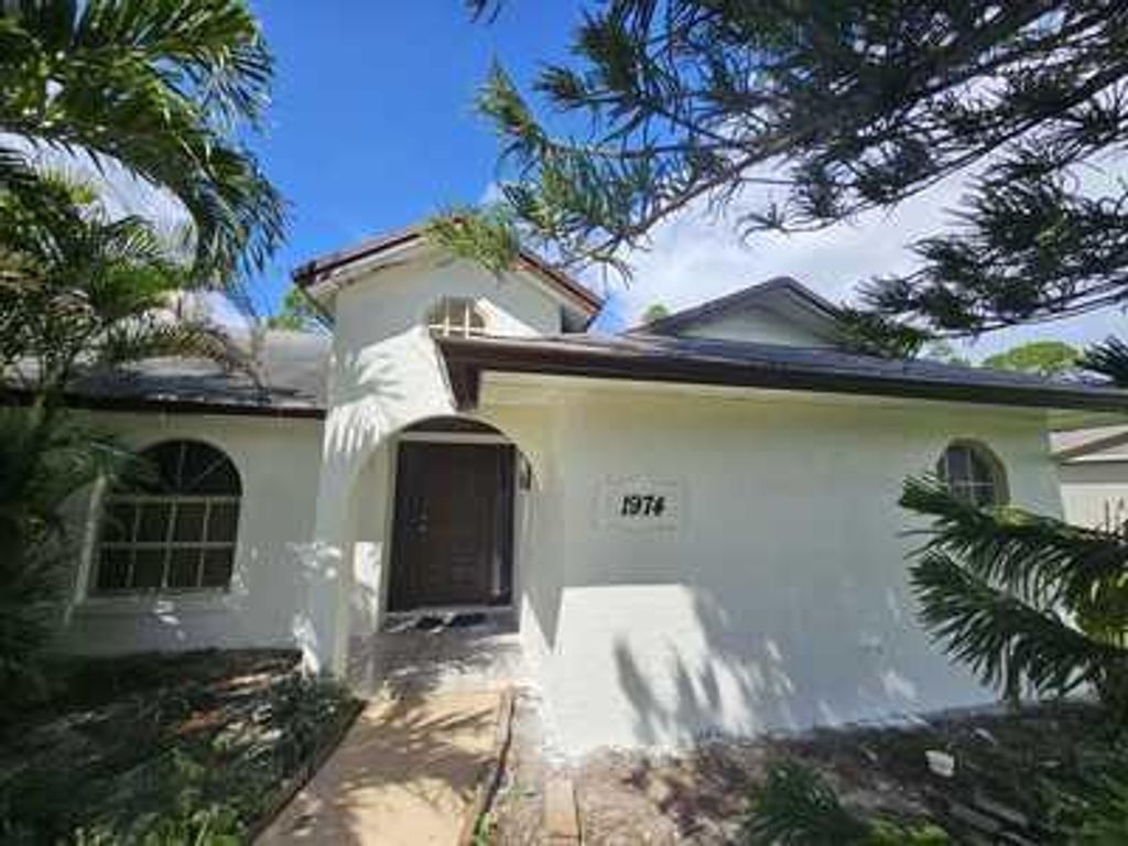 Photo of 1974 SE Floresta Drive, Port St Lucie, FL 34983 (MLS # R10924767)