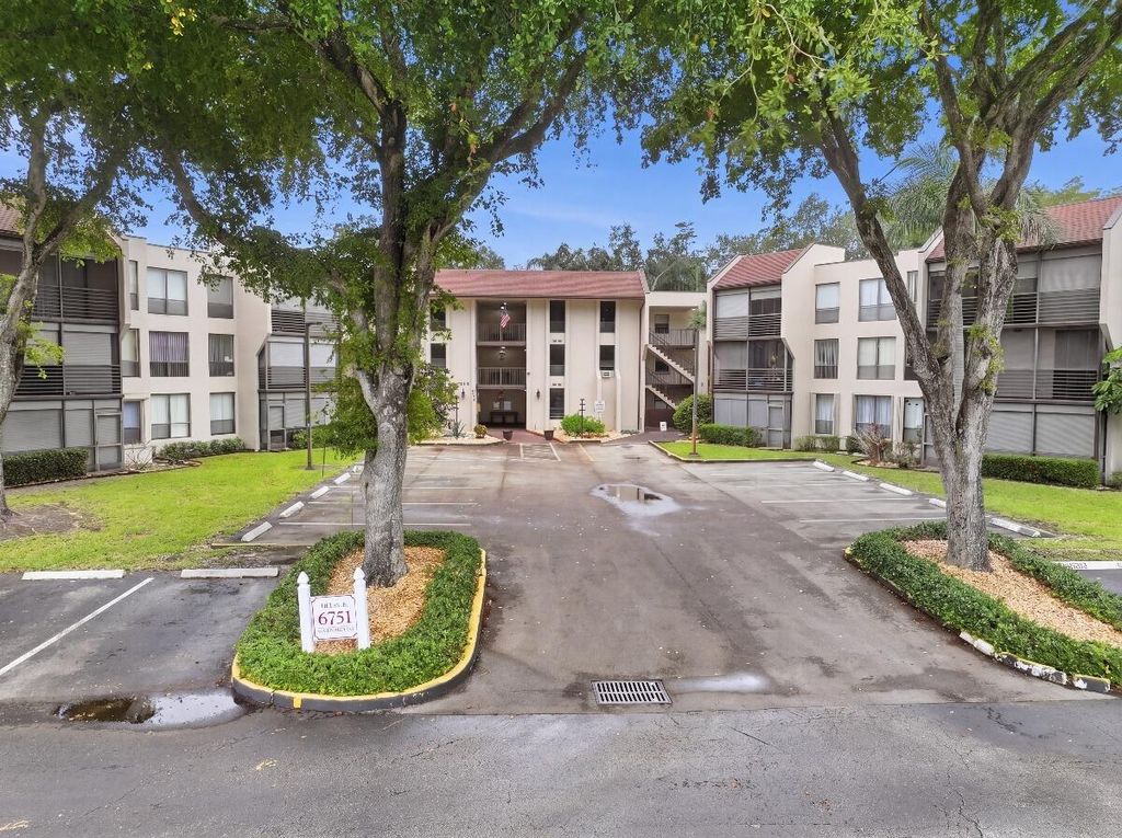 Photo of 6751 N University Drive #Unit 212, Tamarac, FL 33321 (MLS # B26021470)