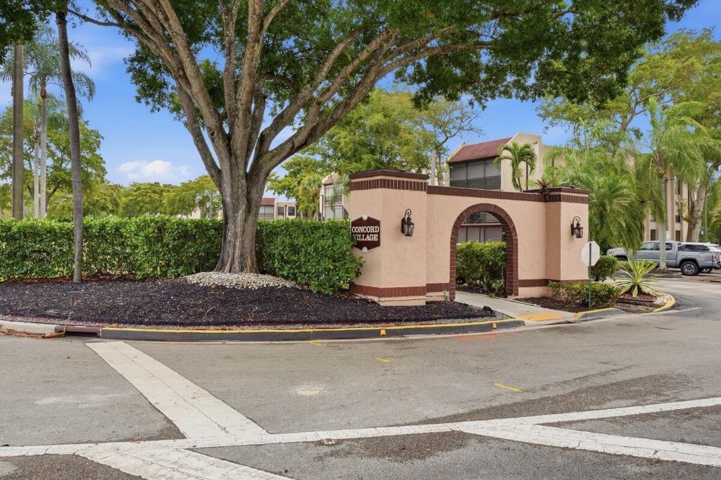 Photo of 6751 N University Drive #Unit 212, Tamarac, FL 33321 (MLS # B26021470)