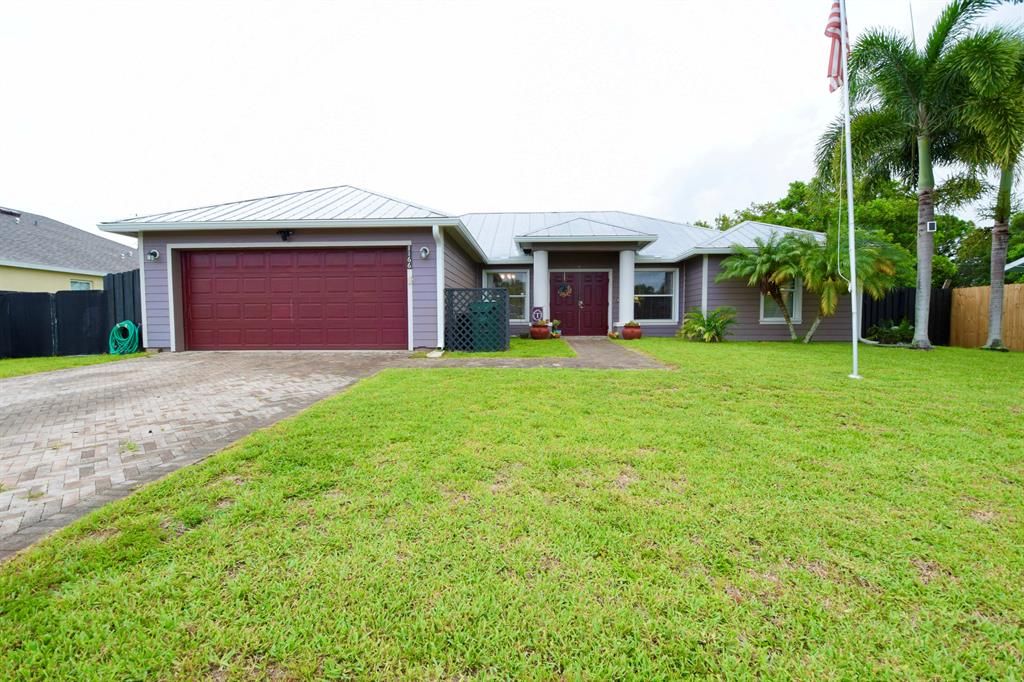 Photo of 1166 SW Dorchester Street, Port Saint Lucie, FL 34983 (MLS # R10730594)