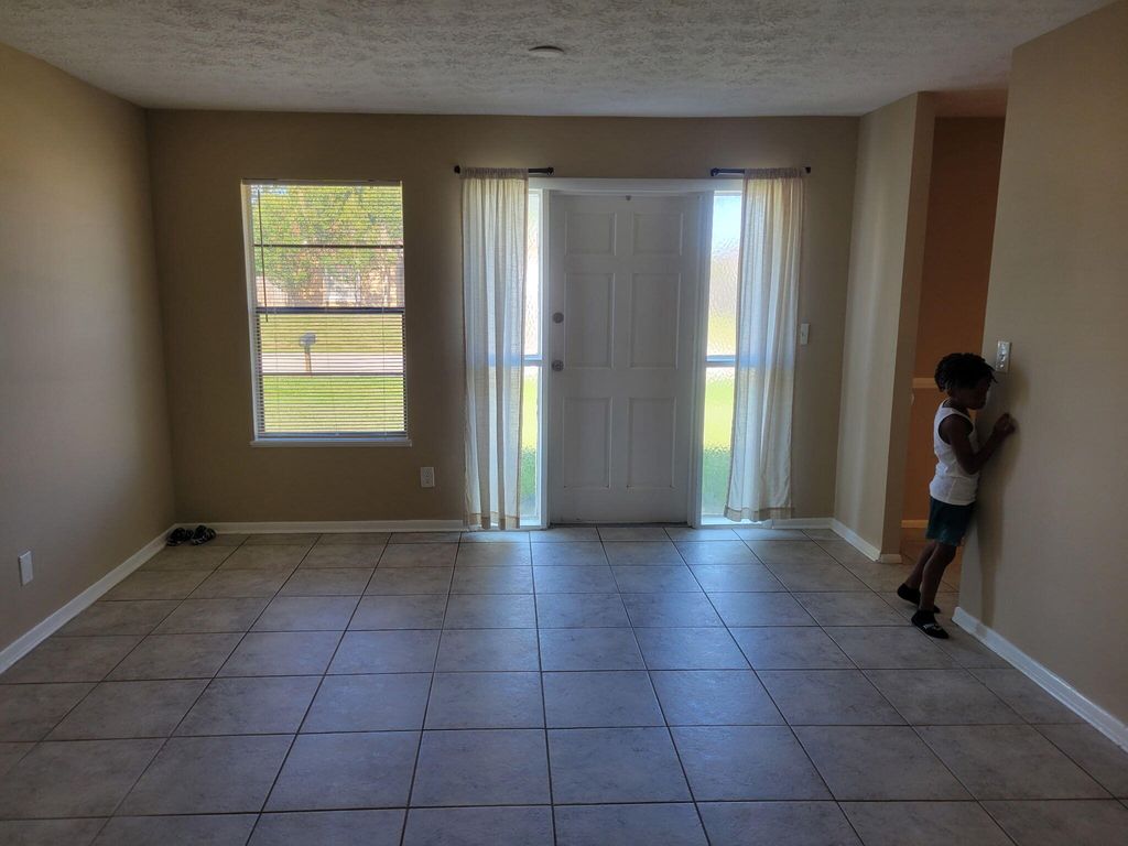 Photo of 312 NW Broadview Street, Port Saint Lucie, FL 34983 (MLS # B26026687)