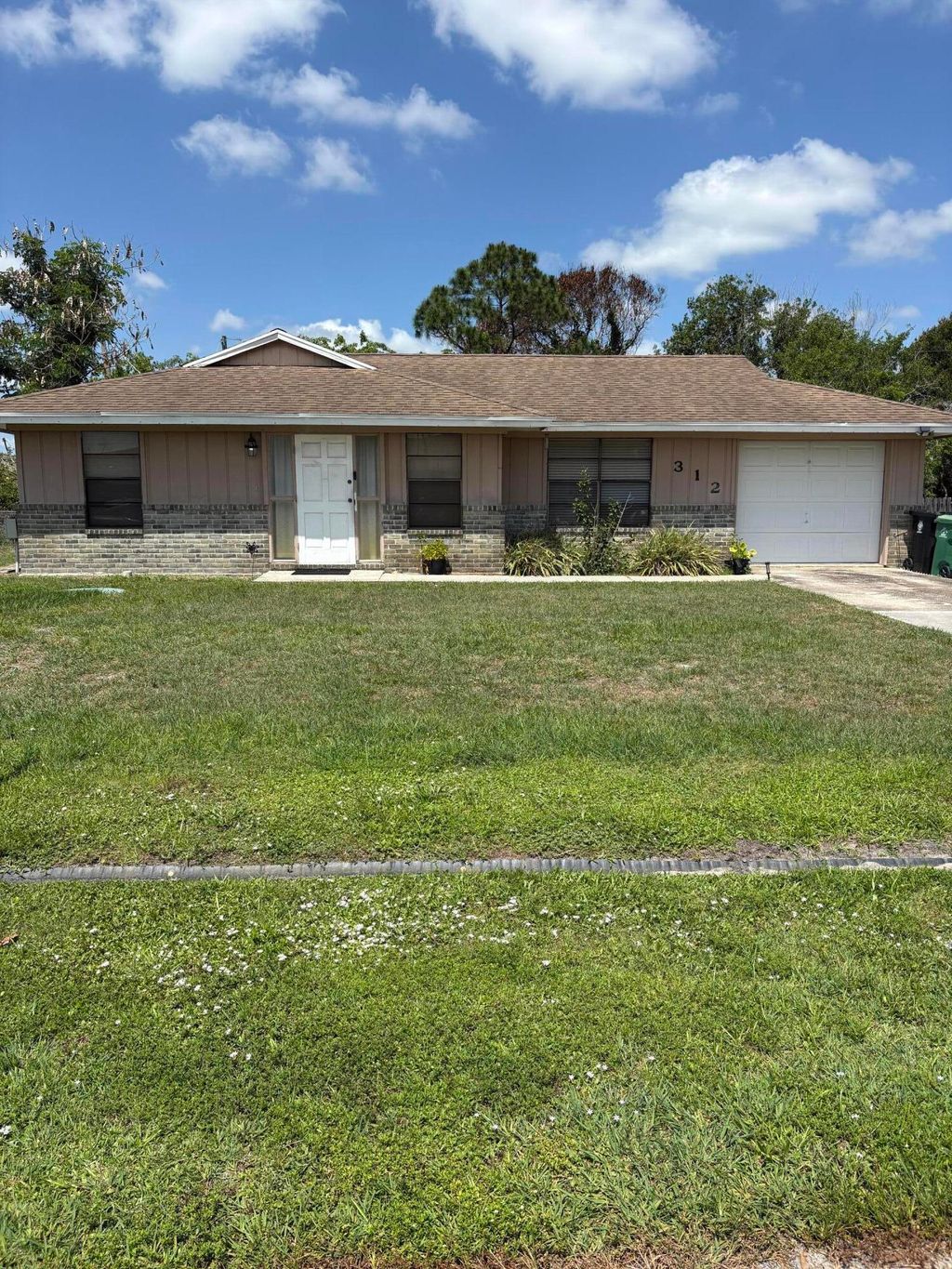 Photo of 312 NW Broadview Street, Port Saint Lucie, FL 34983 (MLS # B26026687)