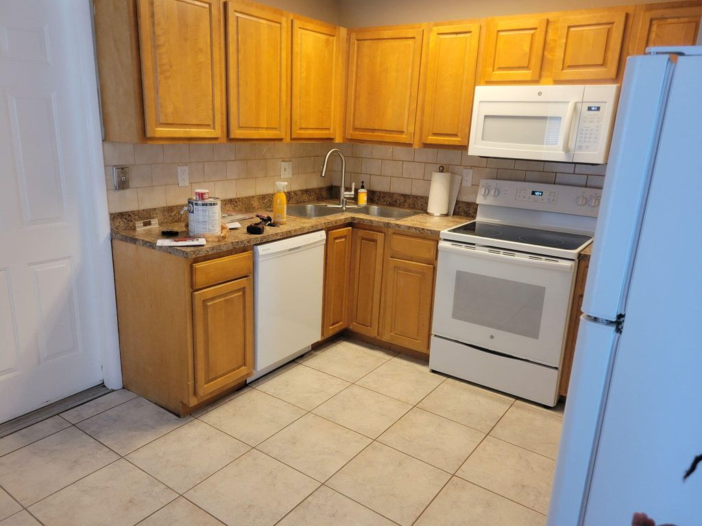 Photo of 312 NW Broadview Street, Port Saint Lucie, FL 34983 (MLS # B26026687)