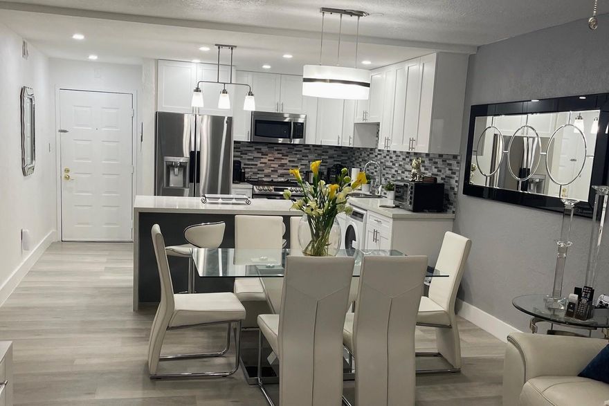 Discover this exceptional two-bedroom, two-bathroom condo  featuring a beautiful updated, open-concept kitchen that is perfect for entertaining. The living and dining areas are complemented by stylish laminate flooring and extend to a charming balcony, offering a nice indoor-outdoor experience.
This property grants access to fantastic community amenities that enhance your lifestyle, including a pool, clubhouse , gym room,  basketball and tennis courts. Great location close to everything!