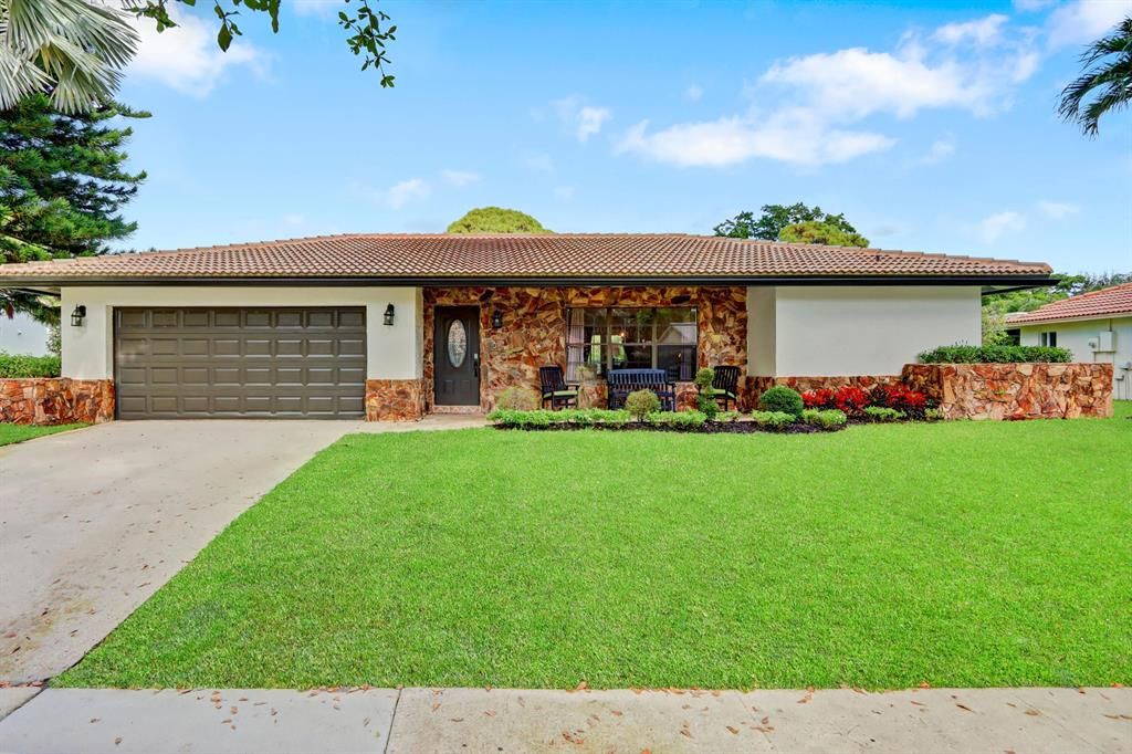 Photo of 2411 NW 35th Street, Boca Raton, FL 33431 (MLS # R10863572)