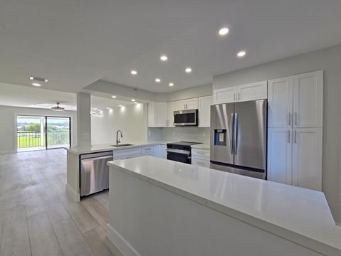 Photo of 14426 Amberly Lane #203, Delray Beach, FL 33446 (MLS # B26051390)