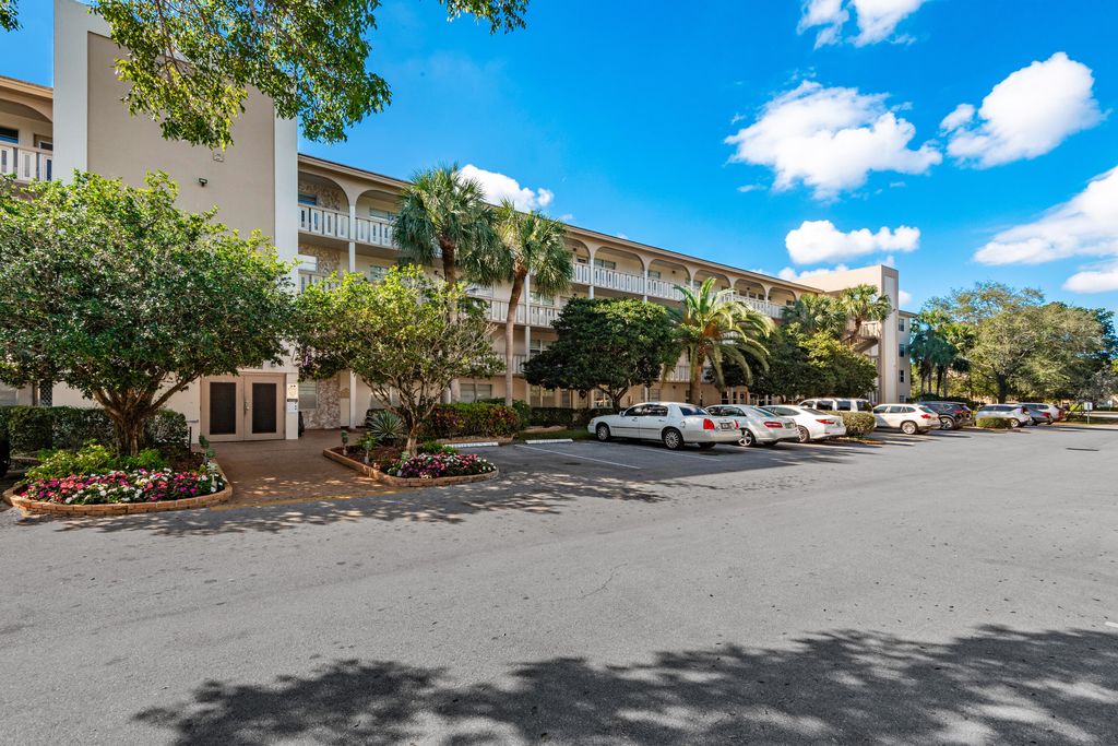 Photo of 2102 Lucaya Bend #J3, Coconut Creek, FL 33066 (MLS # B26003311)