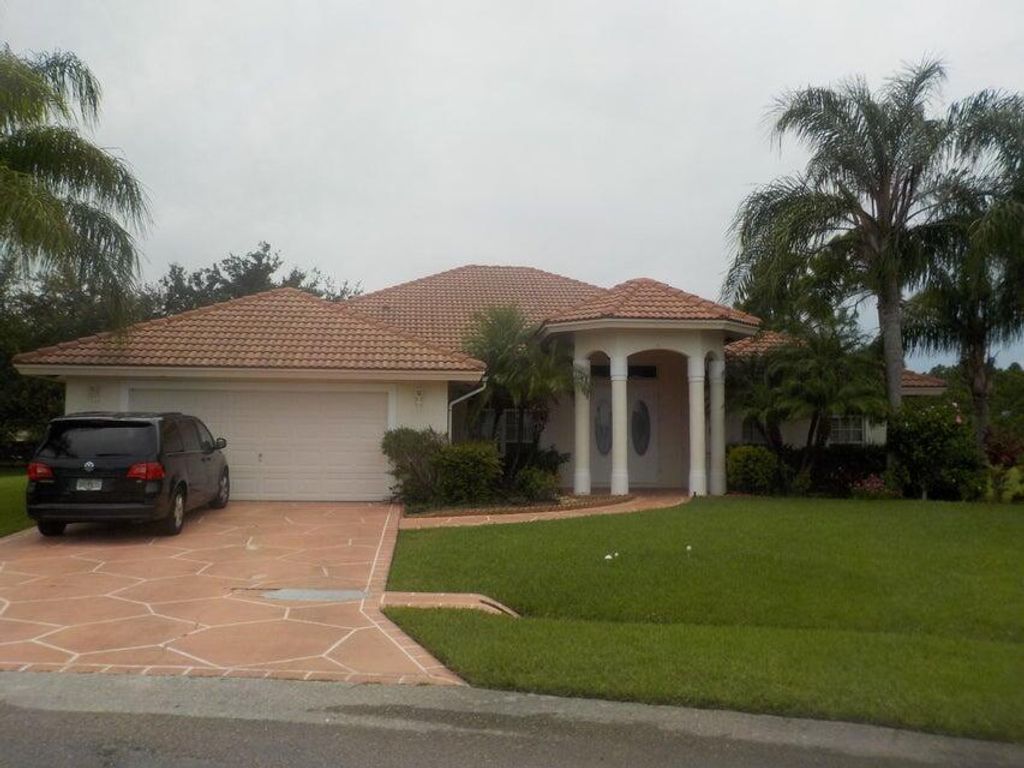 Photo of 5811 NW Rose Petal Court, Port Saint Lucie, FL 34986 (MLS # R10995389)