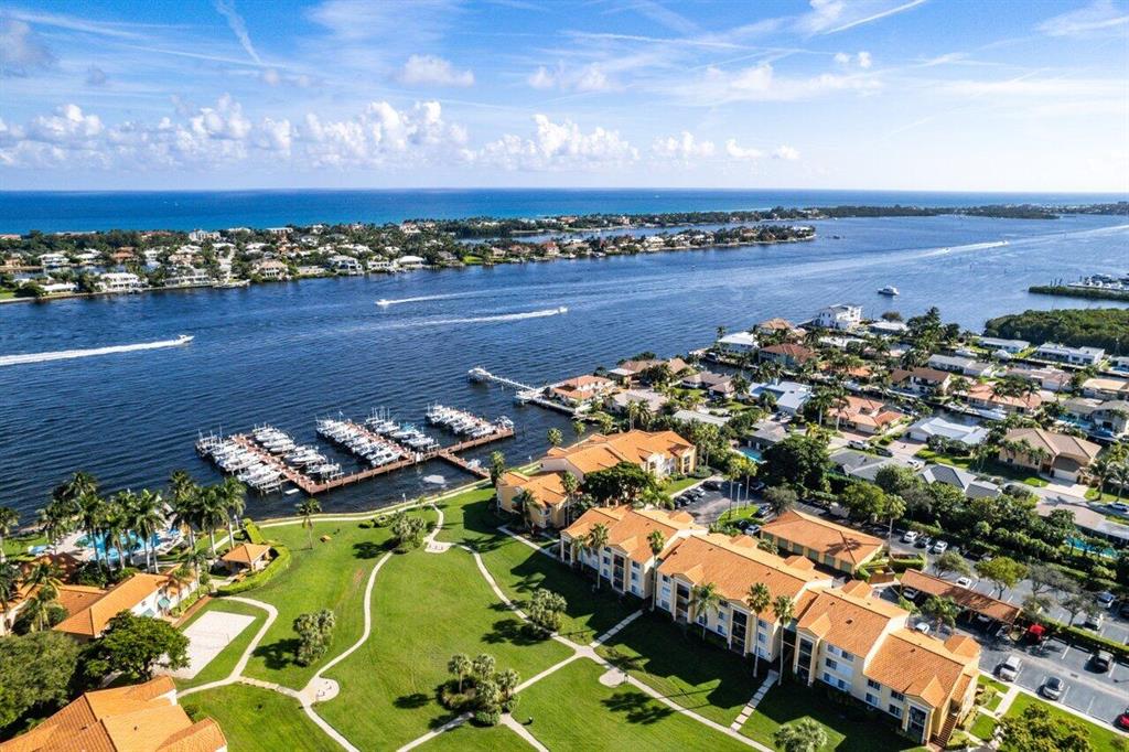 Welcome to The Yacht Club on the Intracoastal gated community with great amenities such as: 2 heated Swimming Pools, Jacuzzi, Tennis Courts, Theater, Fitness Center, Tiki Bar, BBQ Grills, Clubhouse, Dog Park, Preserve Nature area, Private Marina and Boat Slips (which can be acquired separately) No fixed bridges & open Ocean access. A true hidden Gem close to shopping centers, major highways, and only minutes from the beach This condo is also just minutes away from the best restaurants & so many fun places between Palm Beach and Delray Beach areas. Both bedrooms overlook the vast greenery area and the Marina. This larger corner unit offers one main bedroom with a large walking-in closet and a 2nd bedroom with a smaller closet good for a den, office or guest bedroom, and one large full bath.