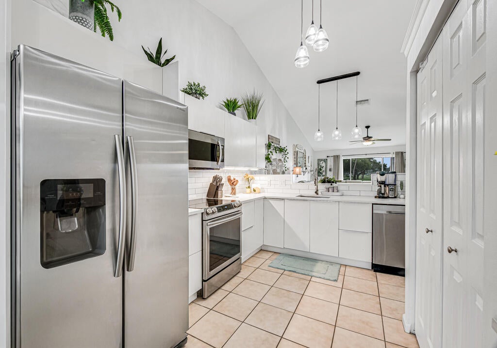 Photo of 8429 LONG BAY, West Palm Beach, FL 33411 (MLS # B26070086)