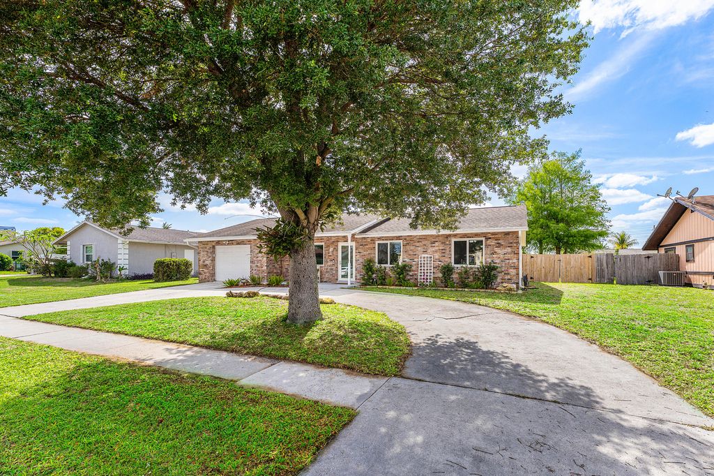 Photo of 144 Cordoba Circle, Royal Palm Beach, FL 33411 (MLS # B26017747)