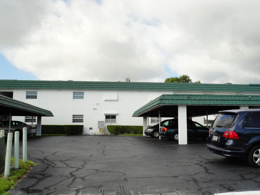 Lovely ground floor w/screened porch overlooking small canal. Great cross breezes. Laundry closet on porch.Cozy yet comfortable. Water heater new 2014. Carport at your door. Short walk to pool/clubhouse/shuffleboard. Walk or bike to Publix/Promenade Plaza and other shoppes. Condo dues will increase Jan 1 from $245 to $280 for future carport assessment.  CURRENT FAR/BAR AS IS CONTRACTS ONLY.  NO motorcycles,RV's,PETS, commercial vehicles. 55+. PLEASE VERIFY ALL MEASUREMENTS.