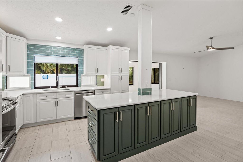 Photo of 5 Copaire Drive, Sewalls Point, FL 34996 (MLS # R11157322)