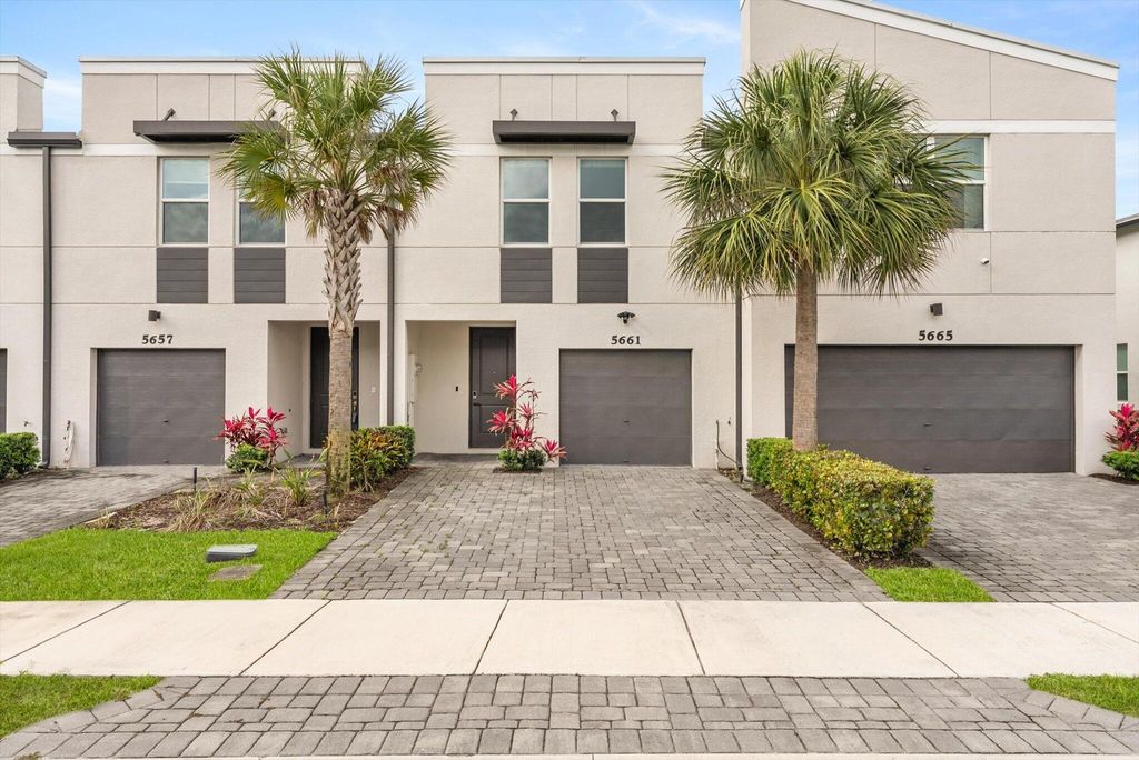 Photo of 5661 Mentmore Drive, Mangonia Park, FL 33407 (MLS # B26017149)