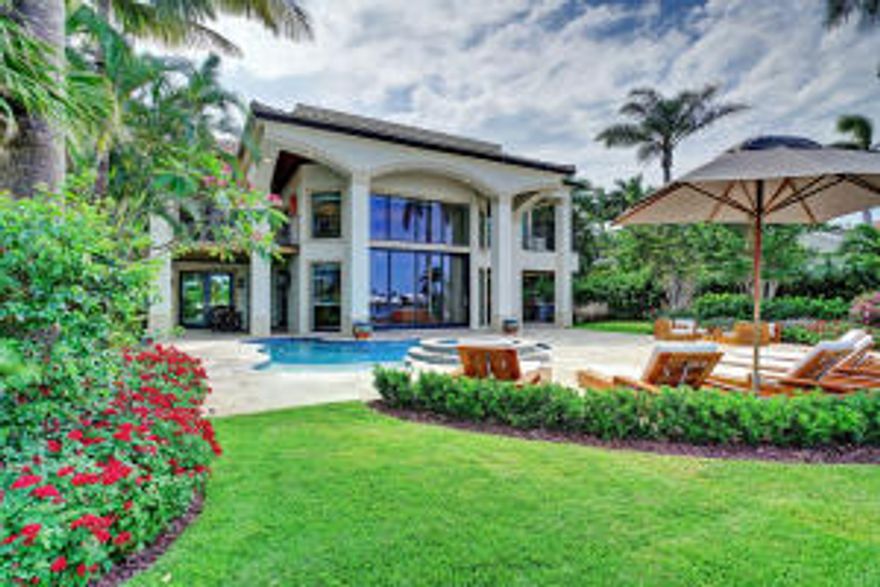 Magnificent New Direct Intracoastal Estate (exterior walls only remained)designed by famed Architect Shane Ames. Features Impact glass, Incredible Kitchen with Tiger Wood Cabinets, Stone countertops, Onyx Backsplash, 4 Viking Ovens and Pro Sub Zero Glass door refrigerator. Dining Room w/ Impressive Wine Room w/ Cigar Humidor. Great Room w/ up lit Blue Agate Bar, and Pocket Sliders to two covered patio areas & pool. First Floor Master Bedroom with incredible master bath with Copper sinks, fossil stone floors, Japanese Soaking Tub, Steam Shower Open to Zen Outdoor Shower. His and Her closets and Her Closet is 2 Stories! Upstairs are 3 ensuite bedrooms & 4th is used as a fantastic den w/ full bath, storage and private Balcony. Great Loggias, Pool, Dockage w Lift, Garage w/lift & generator