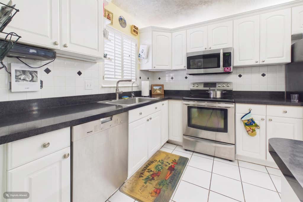 Photo of 8511 OLD COUNTRY Manor #401, Davie, FL 33328 (MLS # B26061261)