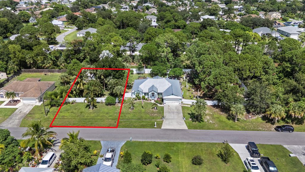 Photo of 1079 SW Placetas Avenue, Port Saint Lucie, FL 34953 (MLS # R11126423)