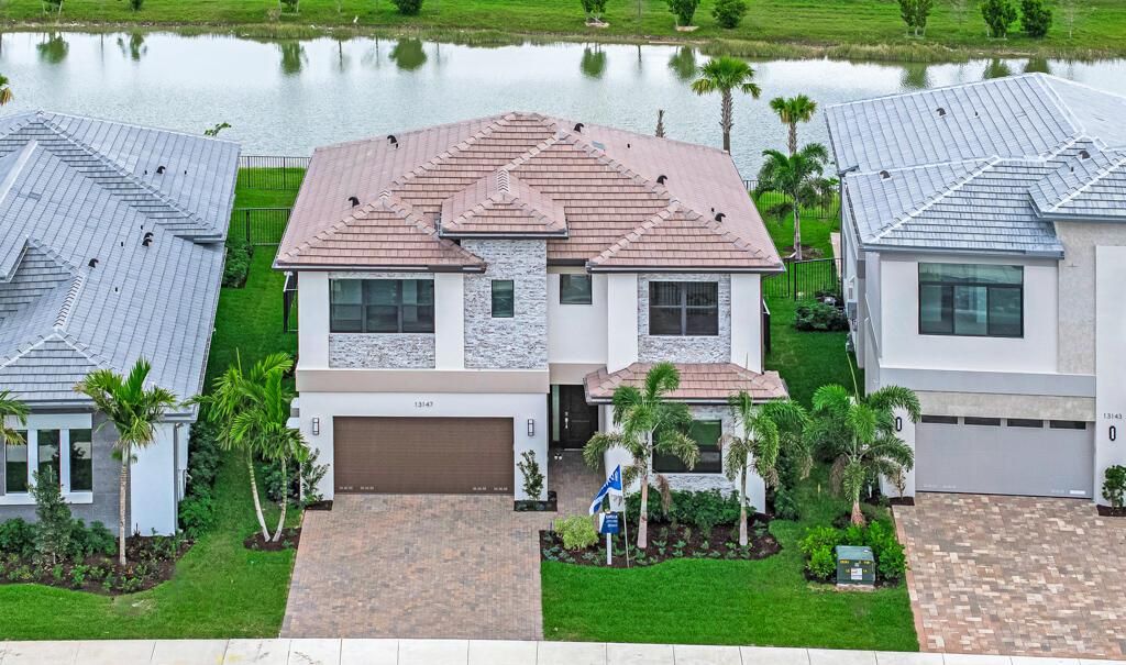Photo of 13147 Feathering Way, Palm Beach Gardens, FL 33412 (MLS # R11015808)