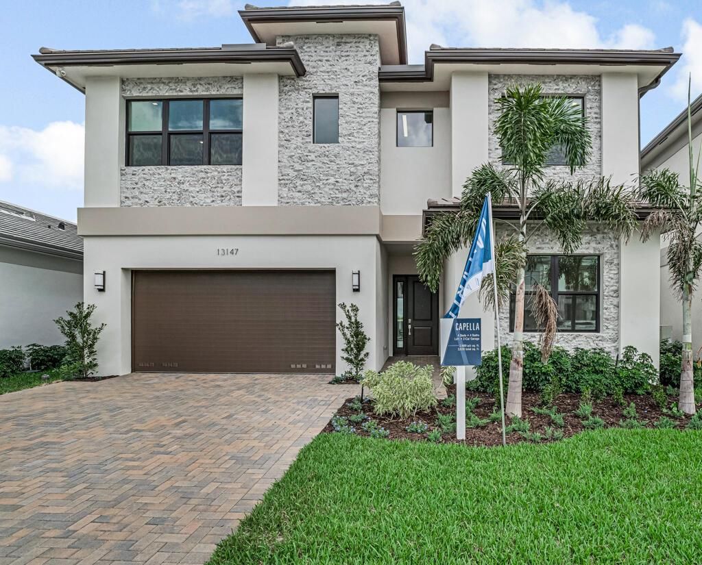 Photo of 13147 Feathering Way, Palm Beach Gardens, FL 33412 (MLS # R11015808)