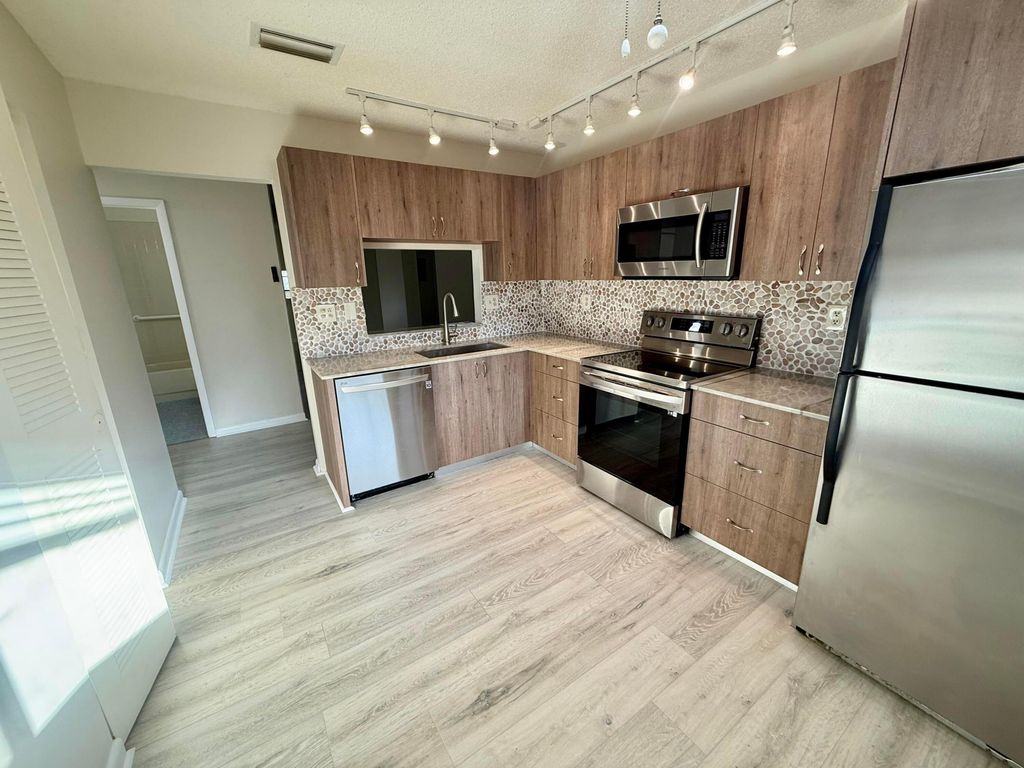 Photo of 15401 Pembridge Avenue #38, Delray Beach, FL 33484 (MLS # R11154295)