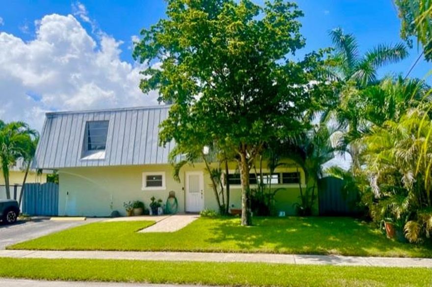 Welcome home to the hidden gem in East Oakland Park! This extremely well kept 3 Bedroom/ 2 Bathroom home with a lake view is move-in ready and a short walk to downtown and the arts district! This unique home overlooks a tranquil lake with an open balcony great for outdoor living and offers an abundance of natural light. And you own a portion of the lake! The home has been freshly painted inside with some brand new installations and features a bedroom suite on the first floor and 2 bedrooms on the second floor. There is also a wonderful space on the 2nd floor landing, perfect for an office or play area. There is a great outside storage on one side of the home with well maintained landscaping surrounding the home. Don't miss out on this opportunity to own in this amazing neighborhood!
