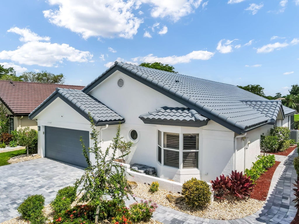 Photo of 21089 Cottonwood Drive, Boca Raton, FL 33428 (MLS # B26043841)