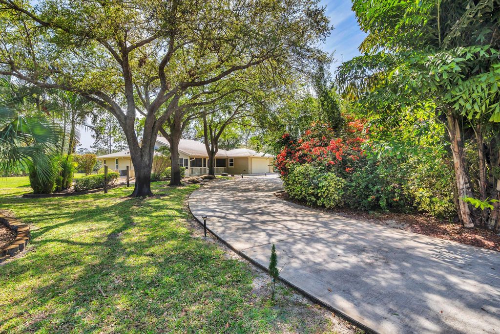 Photo of 14204 Broken Wing Lane, Palm Beach Gardens, FL 33418 (MLS # R10969874)