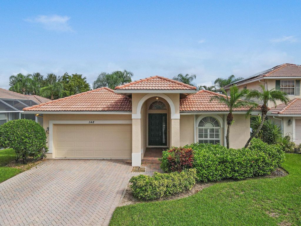 Photo of 148 Hidden Hollow Drive, Palm Beach Gardens, FL 33418 (MLS # R11127027)
