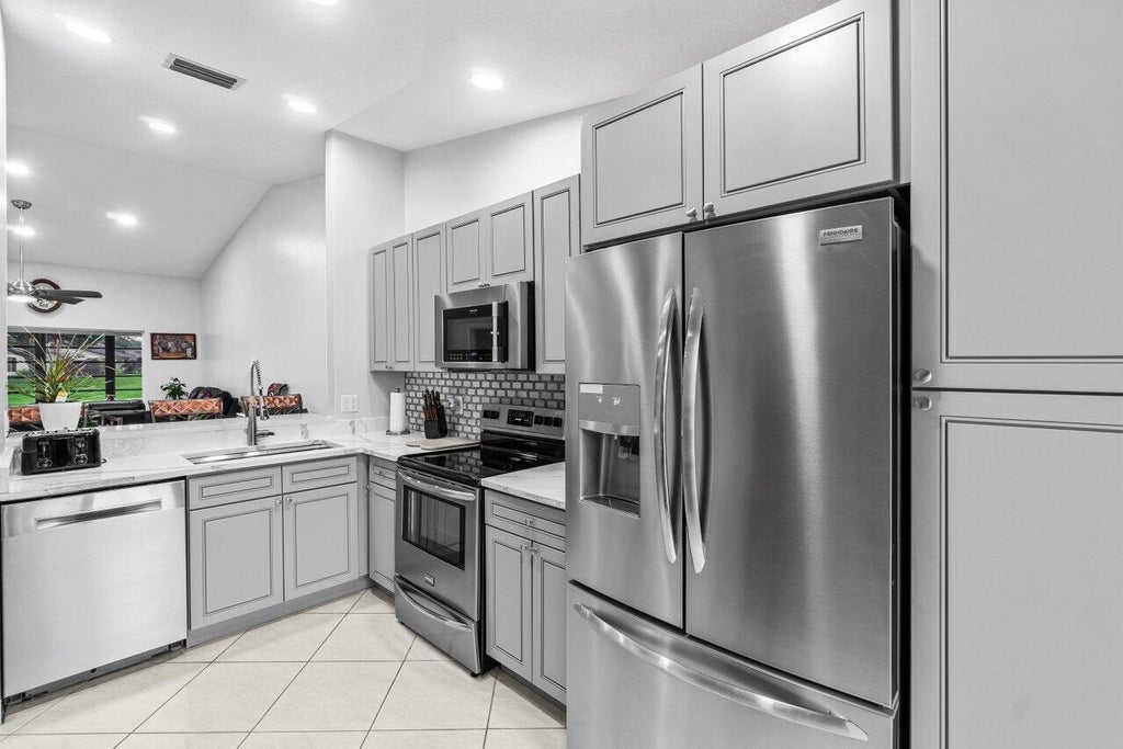 Photo of 3775 Silver Lace Lane, Boynton Beach, FL 33436 (MLS # R11075972)