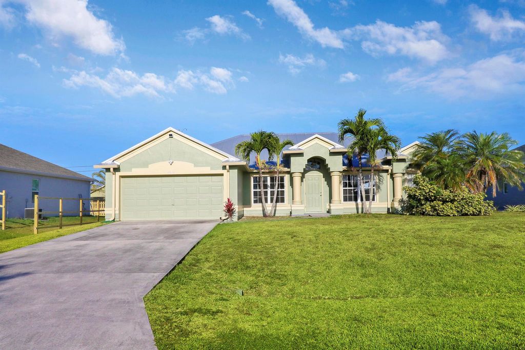 Photo of 4649 SW Galaxie Street, Port Saint Lucie, FL 34953 (MLS # R10979353)