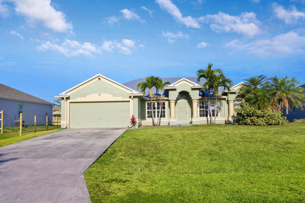 Photo of 4649 SW Galaxie Street, Port Saint Lucie, FL 34953 (MLS # R10979353)