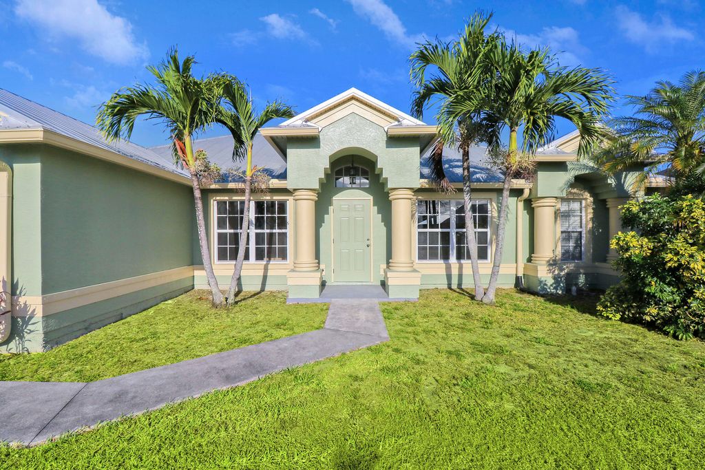 Photo of 4649 SW Galaxie Street, Port Saint Lucie, FL 34953 (MLS # R10979353)