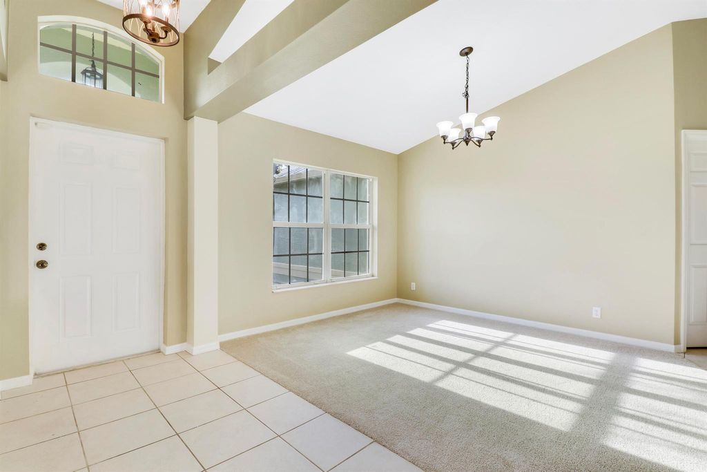 Photo of 4649 SW Galaxie Street, Port Saint Lucie, FL 34953 (MLS # R10979353)