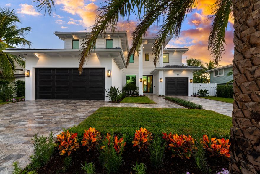 Spectacular Resort style living in this one of a kind waterfront estate in the Village of North Palm Beach. Built in 2022. No detail was spared in the custom design and quality workmanship. This coastal home is professionally appointed with designer finishes and superior materials. With southern exposure, you will enjoy sunrise and sunset views from the pool, spa, back yard and expansive lanai. Located only 5 miles from the blue waters of Palm Beach inlet, you are only minutes to some of the best fishing in the world. With easy access to Palm Beach International airport, upscale dining establishments, and beautiful beaches, the Village of North Palm Beach is one of the top communities in Northern Palm Beach County. Some of the highlights include: 5 bedroom 4.5, bath, office, game room, and 3 car garage, Total Sq. Ft. 6,742, Living Sq. Ft. 4,725, Lot measures 130 x 80, .25 acres, CBS construction, 80' of water frontage, Deep wide canal with ocean access, New 60' dock with composite decking, 20K boat lift, new seawall cap and retaining wall, 2 storage locations for kayaks or paddleboards, Heated salt system pool & spa with double blue quartzscape finish and white marble sun deck, professional landscaping front and back yard, Silver travertine driveways and walkways, Impressive exterior foyer leads to double door entry,
beautiful views of the water and docks, designer finishes, All closets fully built out, Custom ceilings throughout, Custom lighting throughout, Arched entries, Elevator, Natural gas, Engineered oak wood flooring, Kohler fixtures throughout all bathrooms, LED lighting, 12' ceilings, Coffered ceilings, Tankless water heater,
Icynene attic insulation, Gypcrete soundproof floor on second floor, 2 a/c units, Pad and gas hook up for full house generator, Pool, dock, and water views from first and second floors.
First floor features a bright family room with wall to wall 10 ft sliders opening to the oversized lanai, and back yard area. Family room has an EcoSmart fireplace and an impressive staircase with solid oak tread, painted risers and wrought iron railing, The bar area has 2 beverage coolers/wine coolers with temperature control, 3 refrigerator drawers, ice maker, sink, cabinetry with glass door accents and stamped porcelain counter tops. The designer gourmet kitchen has paneled SubZero refrigerator and freezer, 5 burner LaCanche stove with griddle, pot filler, custom vented hood, double oven, shaker cabinetry, and stamped porcelain counter tops. The kitchen island has plenty of room for seating, Shaw's porcelain farmhouse sink, 2 Viking dishwashers, 2 pull out trash cabinets and Perrin & Rowe fixtures. There is an oversized pantry with oak shelving, storage drawers and cabinetry. The first floor also has an office with double barn door entry, built in cabinetry and shelving, 1st floor laundry room and mud room, additional laundry room on 2nd floor, 1st floor guest bedroom (1) has reach in closet and pendant lighting, 1st floor powder room has single vanity, cabana bath has single vanity, shower with frameless glass doors, marble flooring and frosted door with access to the back yard area, summer kitchen has cooler, ice maker, sink, and grill. Master bedroom (2nd floor) has sliders to the wrap around balcony, waterfront views, and large walk-in his and hers closets. Master bath has double vanity, custom mirror, freestanding tub and steam shower. 2nd floor guest bedroom (2) has walk-in -closet and custom lighting. 2nd floor game room / bedroom room (3) has expansive views of the water, 2nd floor Guest bedroom 4 has sliders to the wrap around balcony en-suite bath with single vanity and shower. 5th bedroom/optional gym- no closet at this time. 2nd floor guest bath has single vanity and shower Game room has an attached guest bath with single vanity and shower. The wrap around balcony has porcelain tile flooring, tongue & groove ceilings, and an expansive view of the water. This home is perfectly situated in the heart of North Palm Beach. Minutes to the new North Palm Beach Country Club featuring the newly redesigned Jack Nicklaus Signature golf course, pool, tennis, and fine dining