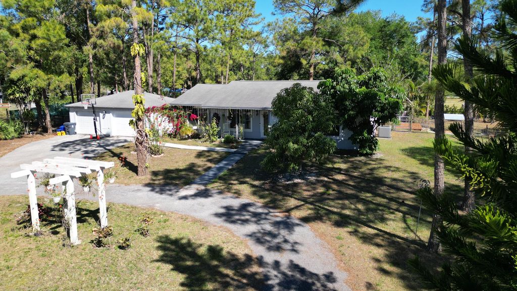 Photo of 13619 57th Place N, West Palm Beach, FL 33411 (MLS # B26023438)