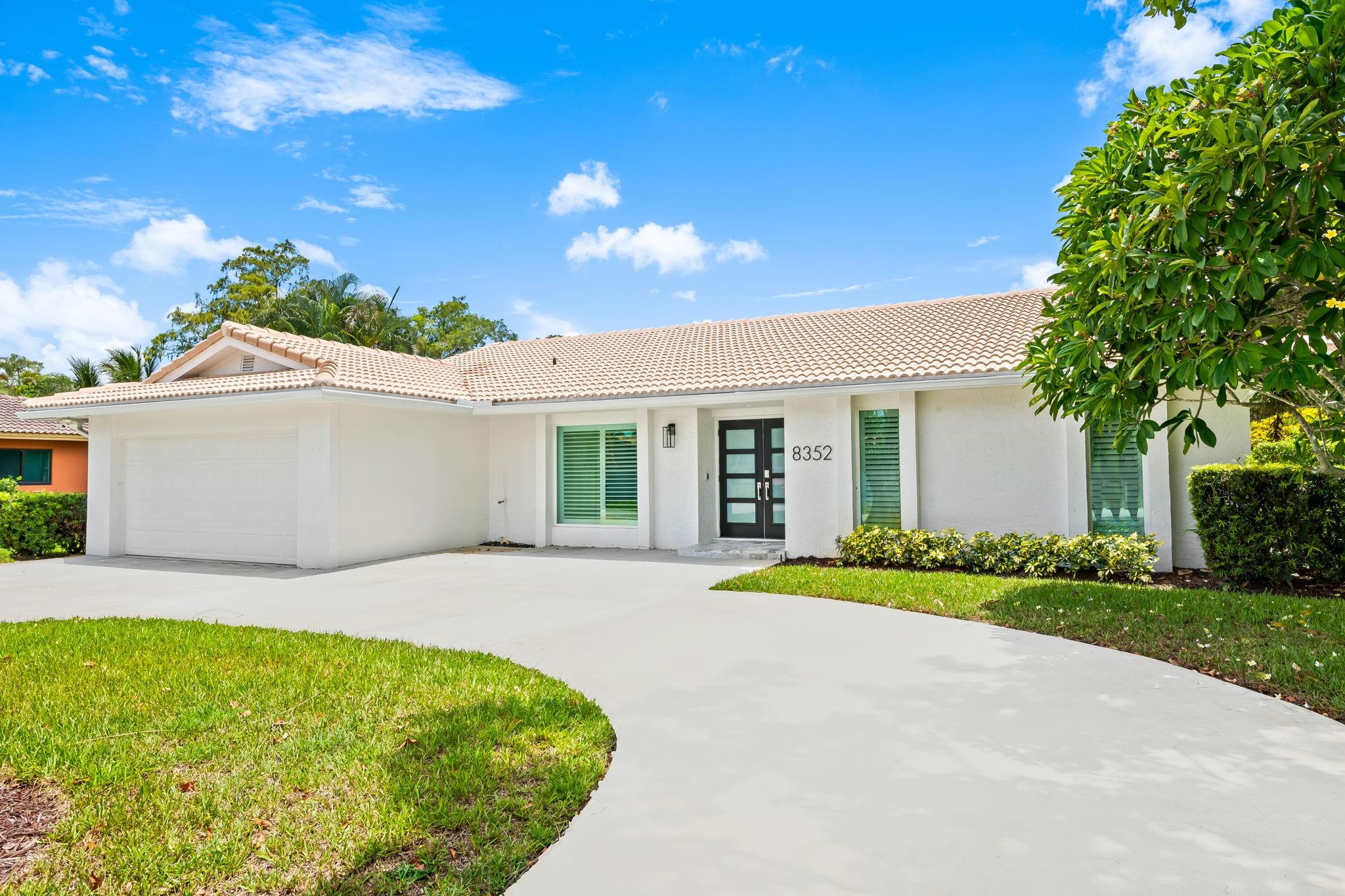 Welcome to this beautifully renovated home tucked away on a quiet street in Coral Springs. This move-in-ready residence features a designer kitchen with high-end JennAir appliances, an oversized island, high hat lighting and impact windows and doors. The split floor plan offers privacy and functionality, while the open layout provides a seamless flow for entertaining. Enjoy a large, private backyard with a pool and covered patio for ultimate enjoyment. Complete with a two-car garage and large circular driveway, this home is ideally located near schools, parks, shopping, and dining.