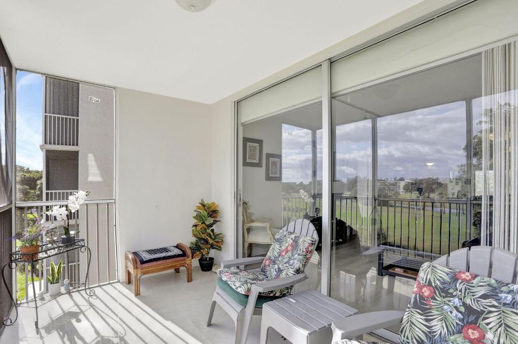 Photo of 2851 S Palm Aire Drive #407, Pompano Beach, FL 33069 (MLS # R11154476)