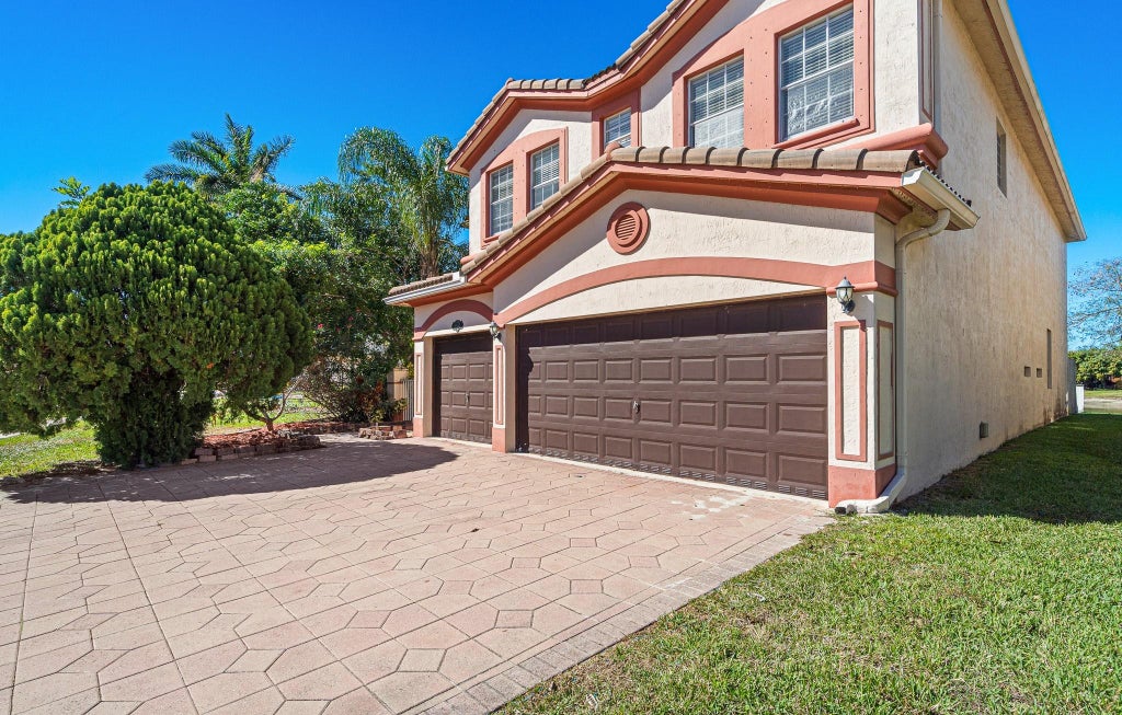 Photo of 10633 OLD HAMMOCK Way, Wellington, FL 33414 (MLS # B26083573)