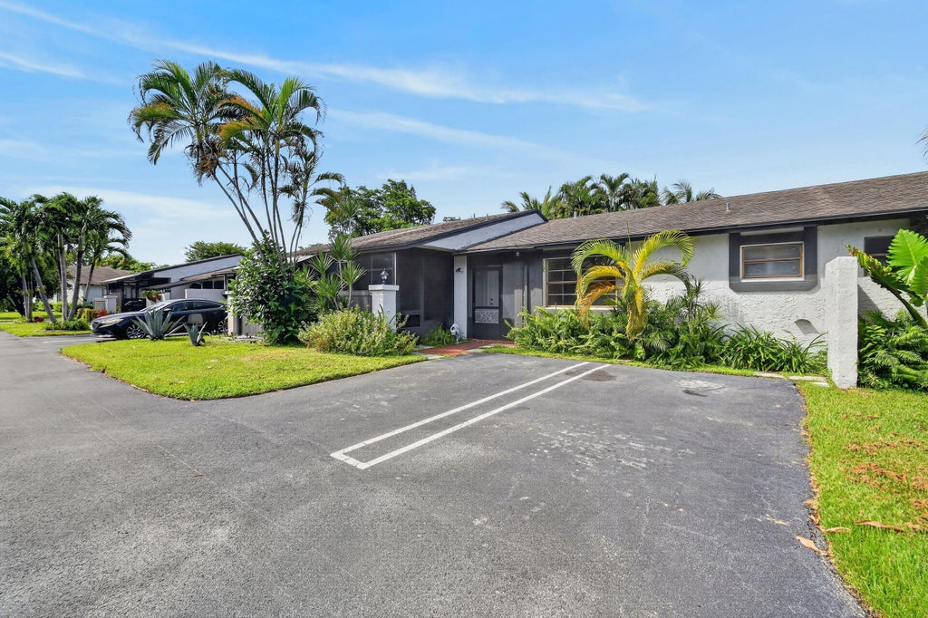 Photo of 72 CONASKONK Circle, Royal Palm Beach, FL 33411 (MLS # B26081410)