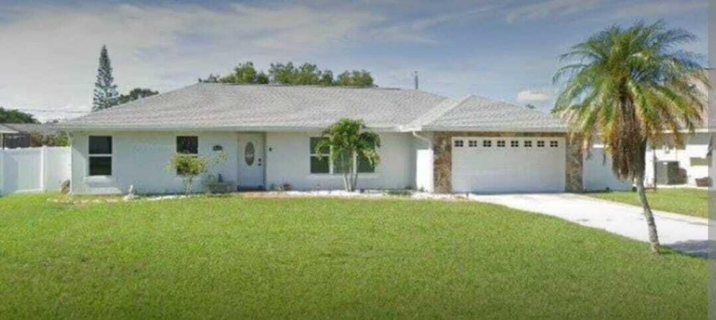 Photo of 1134 SE Mendoza Avenue, Port Saint Lucie, FL 34952 (MLS # B26076321)