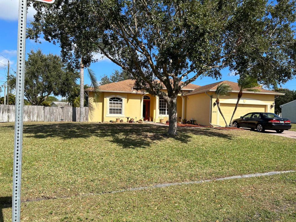 Photo of 2701 SE Bishop Avenue, Port Saint Lucie, FL 34952 (MLS # R11001311)