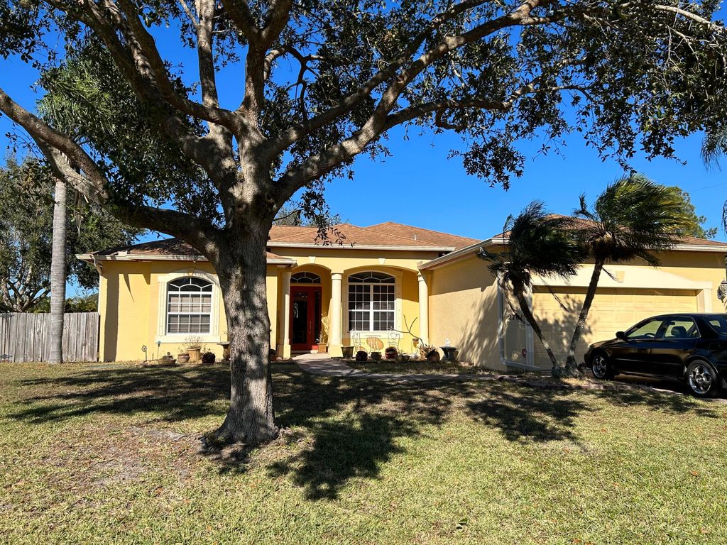 Photo of 2701 SE Bishop Avenue, Port Saint Lucie, FL 34952 (MLS # R11001311)