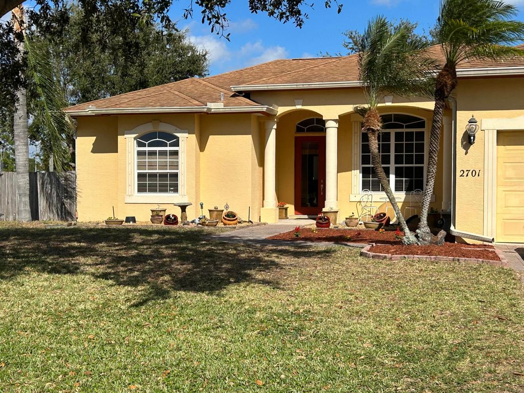 Photo of 2701 SE Bishop Avenue, Port Saint Lucie, FL 34952 (MLS # R11001311)
