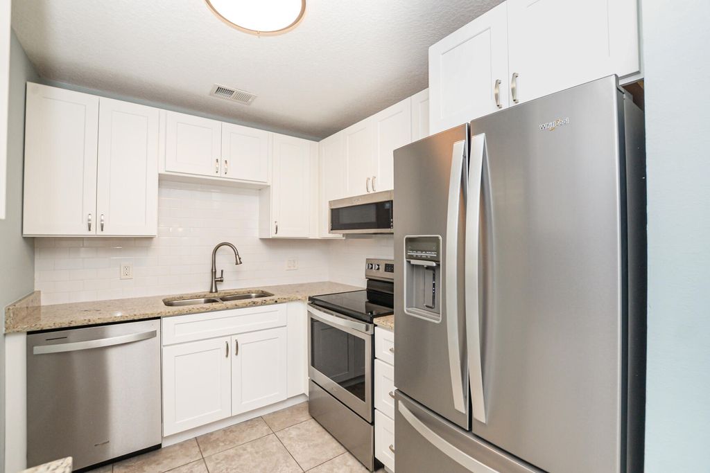 Photo of 10 Lake Vista Trail #203, Port Saint Lucie, FL 34952 (MLS # R10983524)